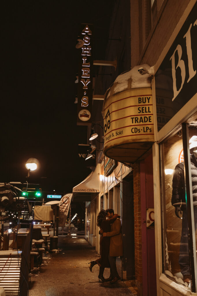 Man and woman stand together outside of Ashley's in Ann Arbor Michigan